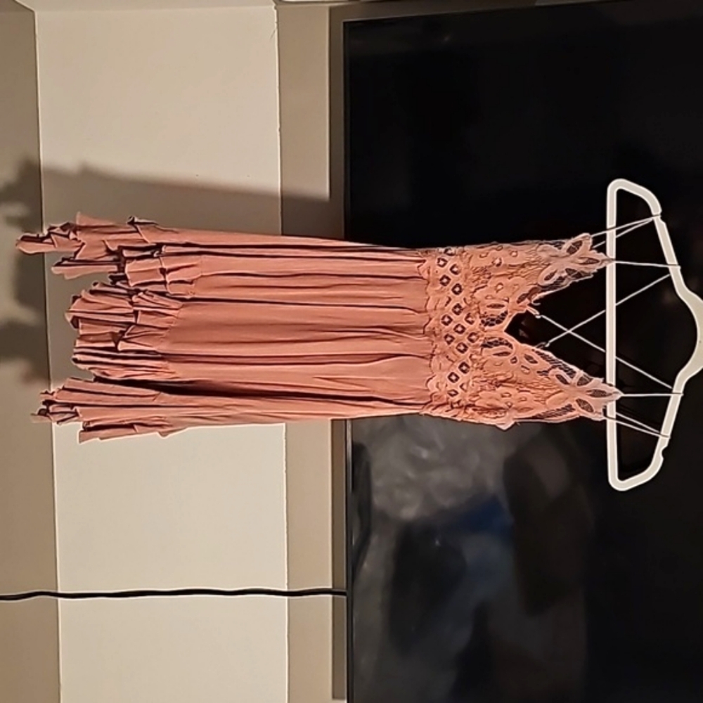 Buckle dress light pink. Almost knee length, I'm 5' 7".